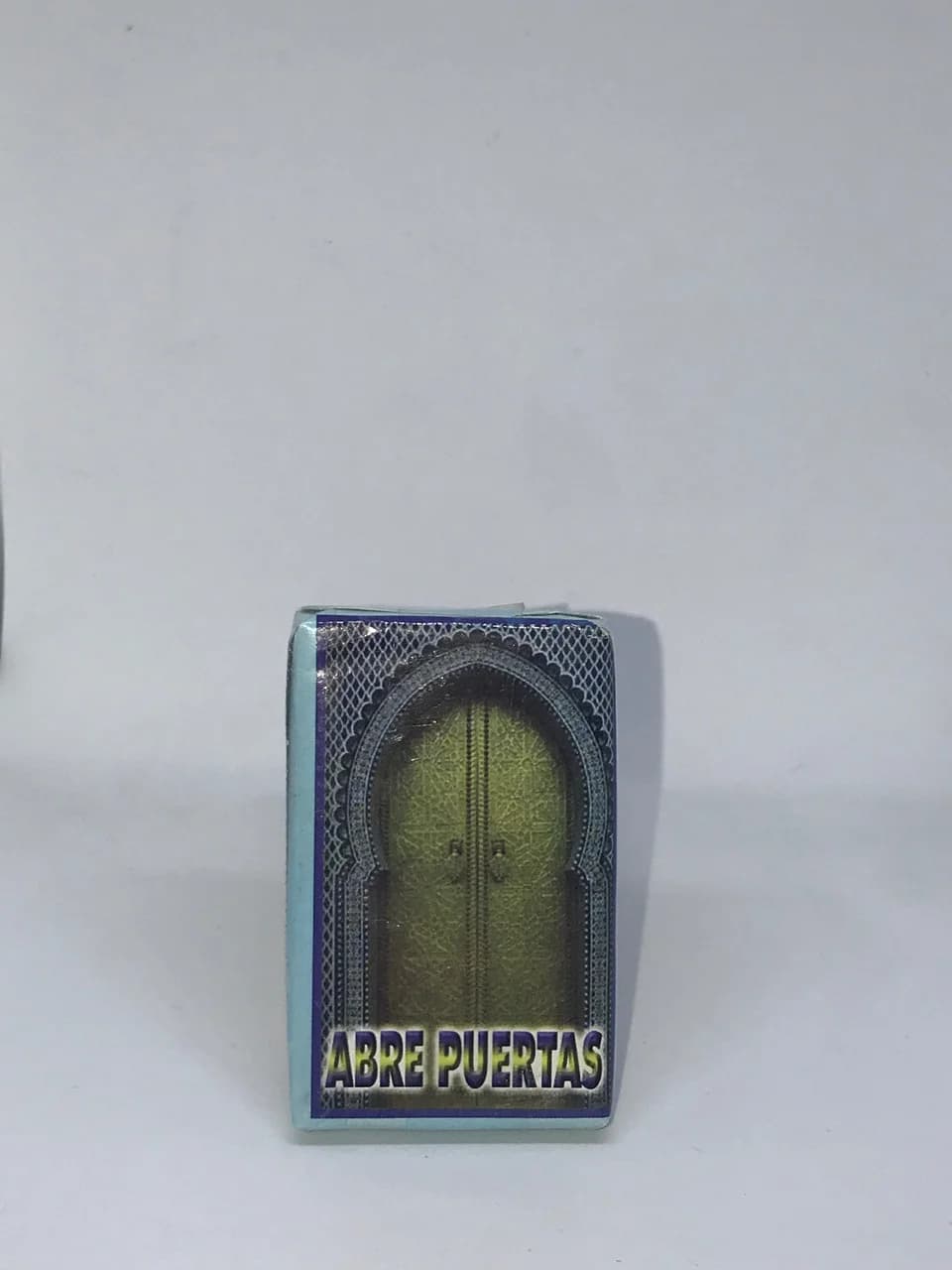 Lata de jabón espiritual Abre Puertas con diseño de puerta decorada.