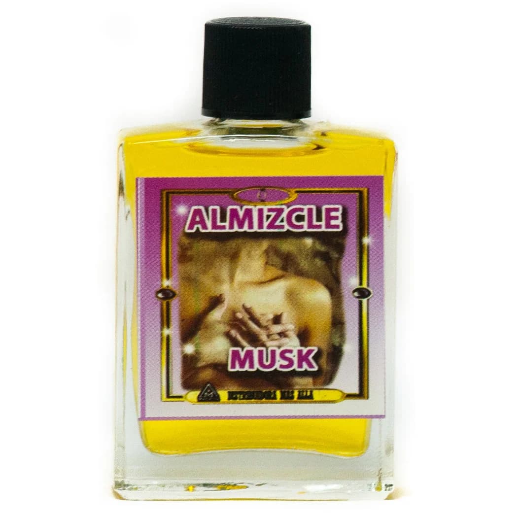 Frasco de perfume esotérico Almizcle Musk con etiqueta identificada.